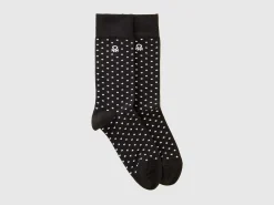 Long socks with black hearts