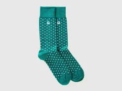 Long socks with green hearts
