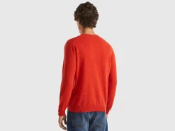Marl orange V-neck sweater in pure Merino wool