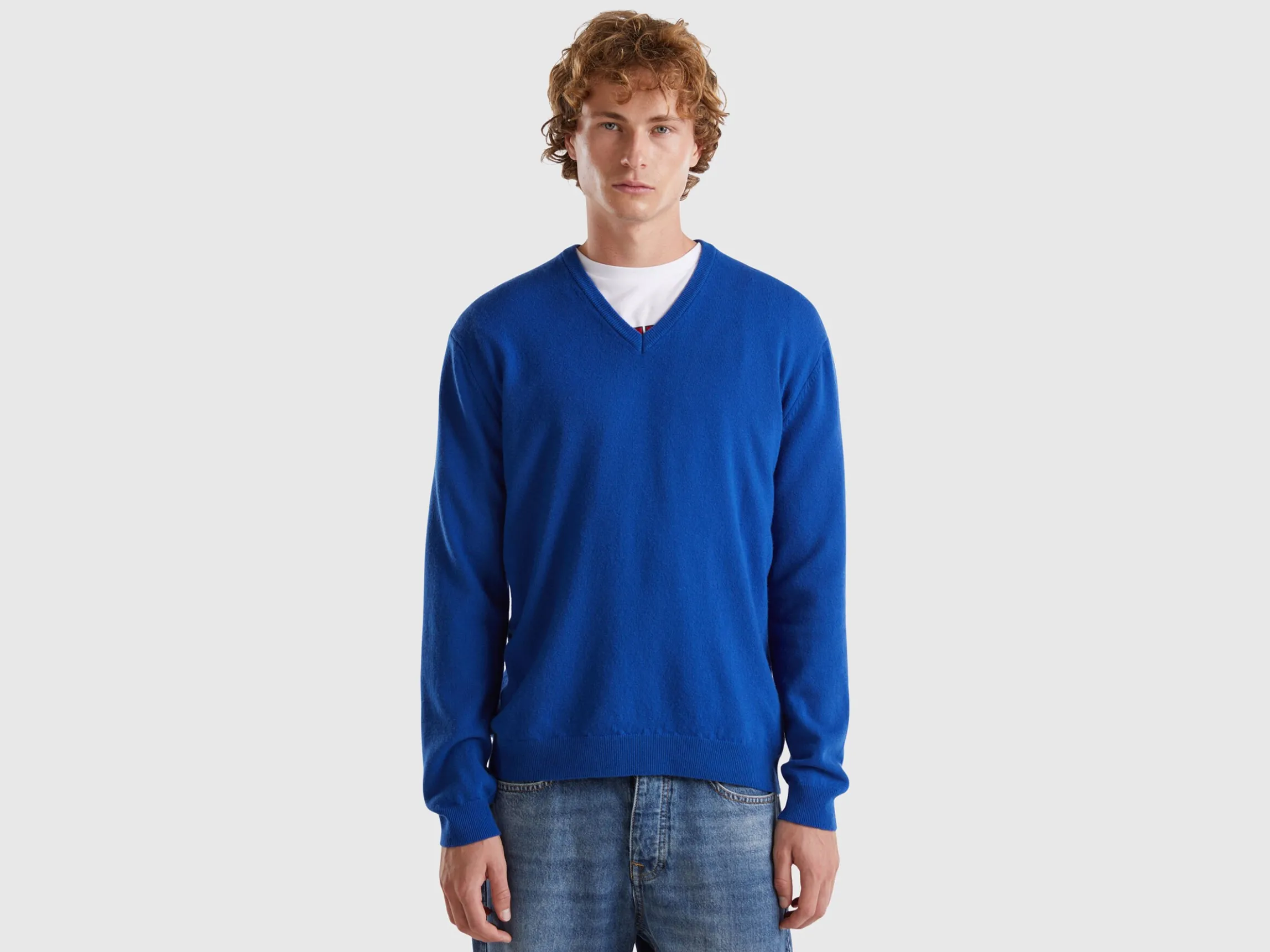 Midnight blue V-neck sweater in pure Merino wool