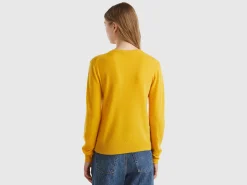 Ochre yellow crew neck sweater in pure Merino wool