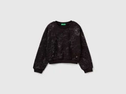 Oversized sweatshirt with glitter