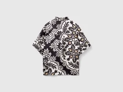 Patterned blouse with rouches on the neck