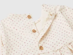 Patterned dress with bow