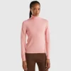 Pink turtleneck sweater in pure Merino wool