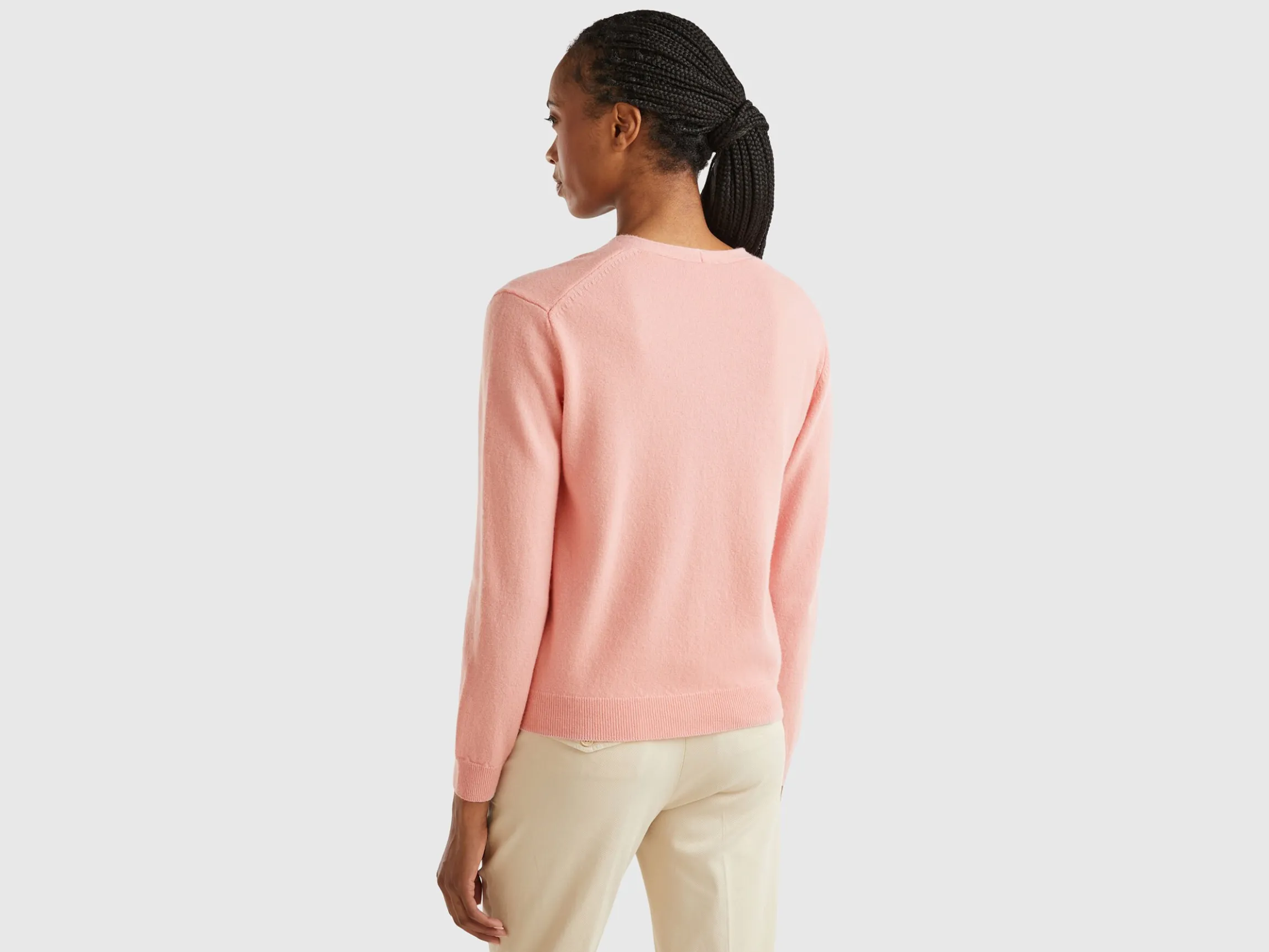 Pink V-neck cardigan in pure Merino wool