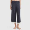 Polka dot trousers with lace details