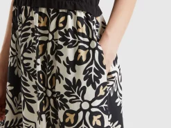 Polo-style dress with printed skirt