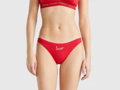 Red Christmas briefs with text embroidery