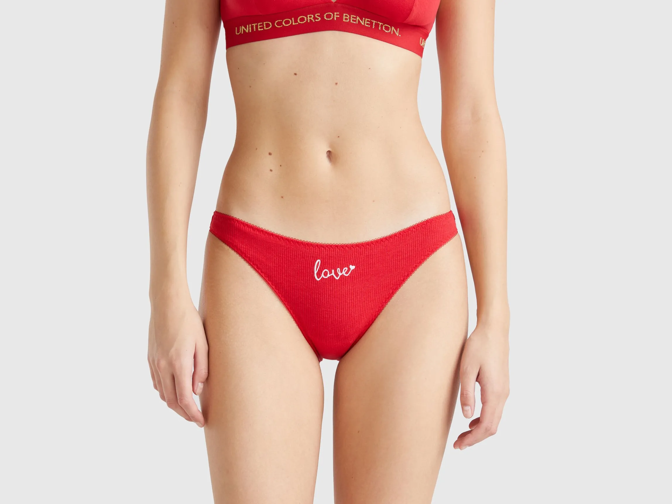 Red Christmas briefs with text embroidery