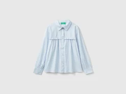 Shirt with rouches on the yoke