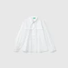 Shirt with rouches on the yoke