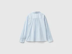 Shirt with rouches on the yoke