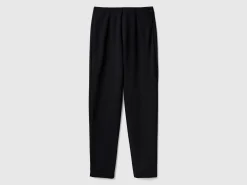 Skinny fit trousers