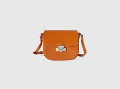 Small crossbody bag in synthetic patent leather
