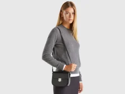 Small crossbody bag in synthetic patent leather