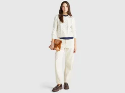 Sweater with cable knit and rhinestones