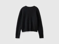 Sweater with cable knit and rhinestones