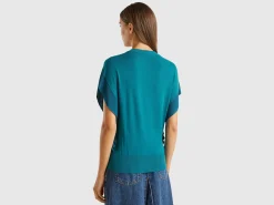 Sweater with draping