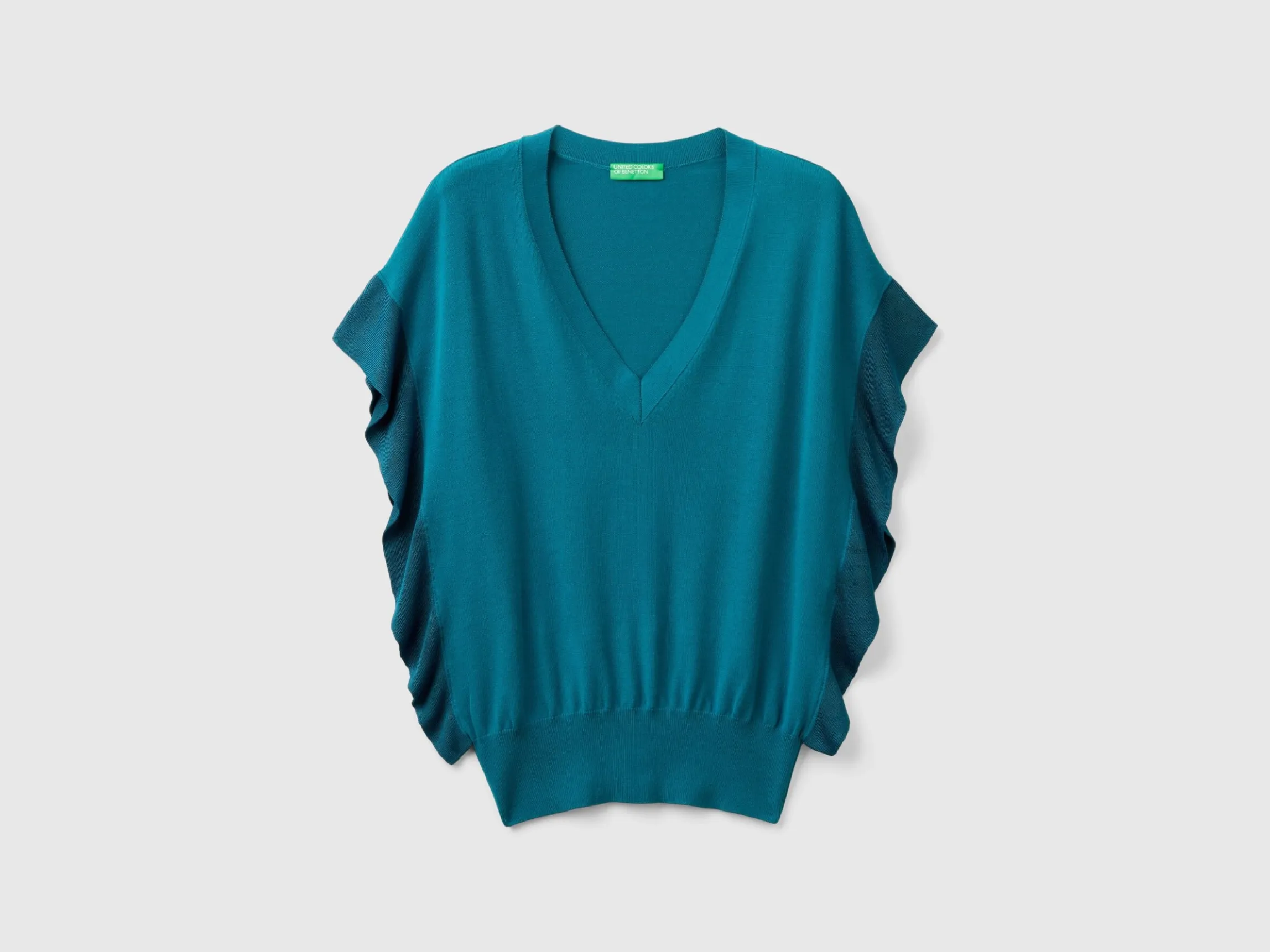 Sweater with draping