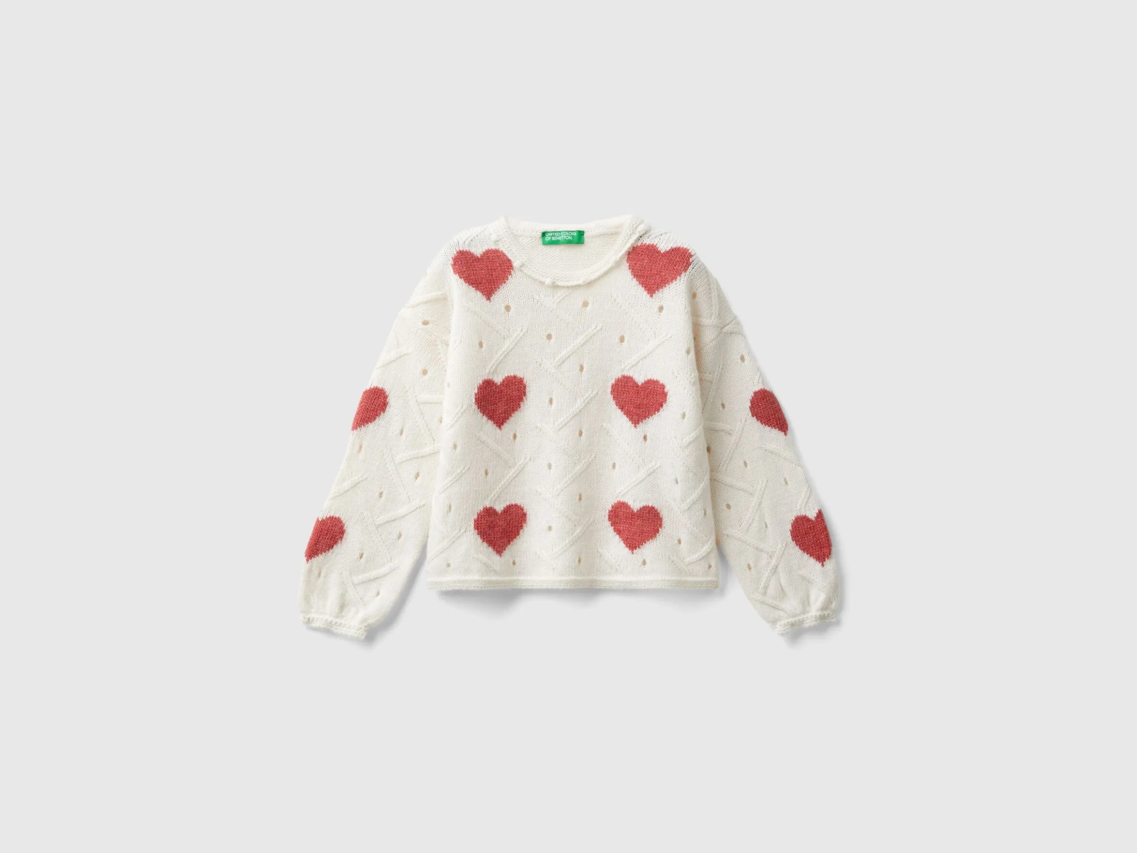 Sweater with heart inlay