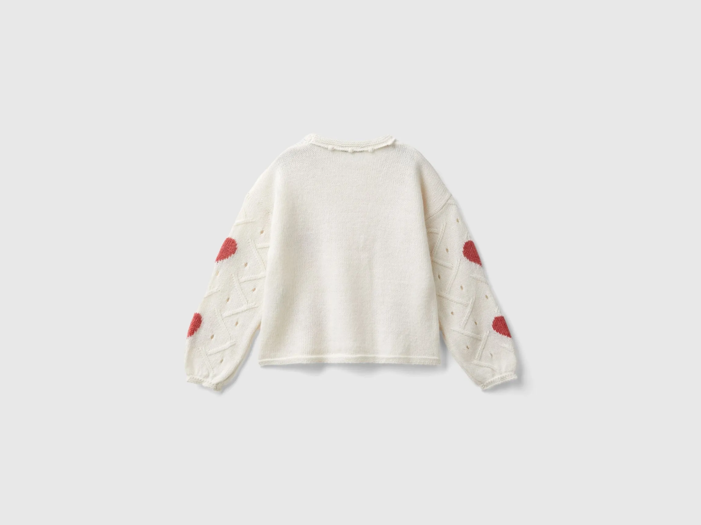 Sweater with heart inlay