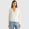Sweater with opening at back