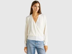 Sweater with opening at back