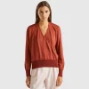 Sweater with opening at back