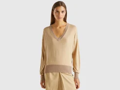 Sweater with opening at back