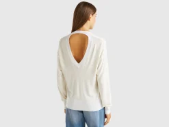 Sweater with opening at back