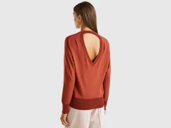 Sweater with opening at back