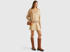 Sweater with opening at back