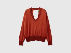 Sweater with opening at back
