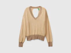 Sweater with opening at back
