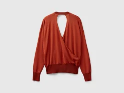 Sweater with opening at back
