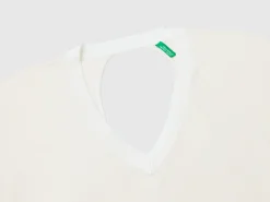 Sweater with opening at back