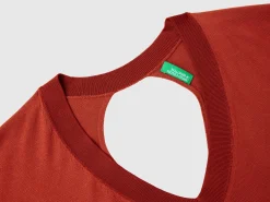 Sweater with opening at back