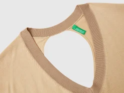 Sweater with opening at back