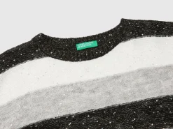 Sweater with recycled fabric and sequins
