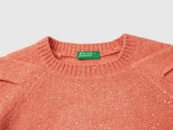 Sweater with recycled fabric and sequins