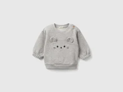 Sweatshirt with embroidery and patches in organic cotton