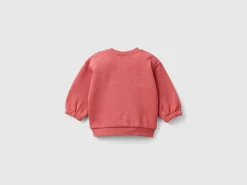 Sweatshirt with embroidery and patches in organic cotton