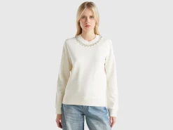 Sweatshirt with jewel effect applique