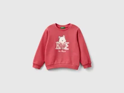 Sweatshirt with petal look applique