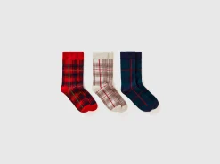 Three pairs of tartan socks