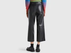 Trousers in imitation leather fabric