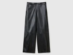 Trousers in imitation leather fabric