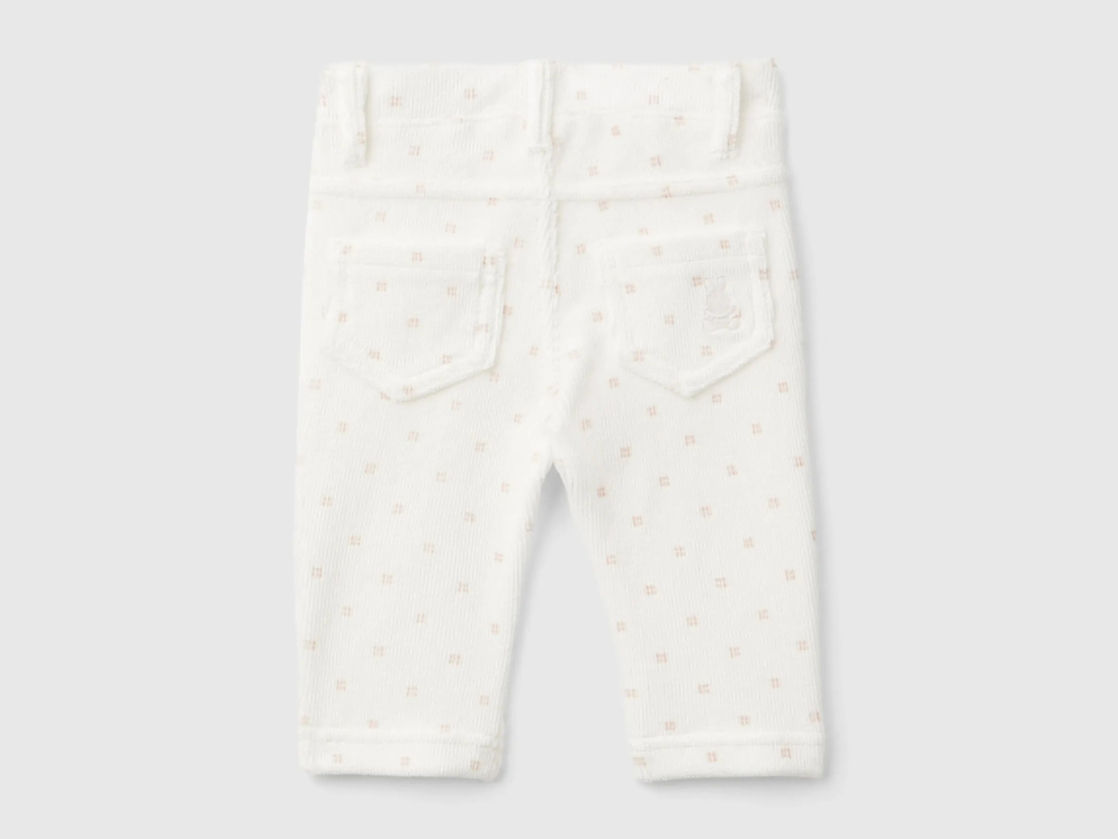 Trousers with chenille pattern print