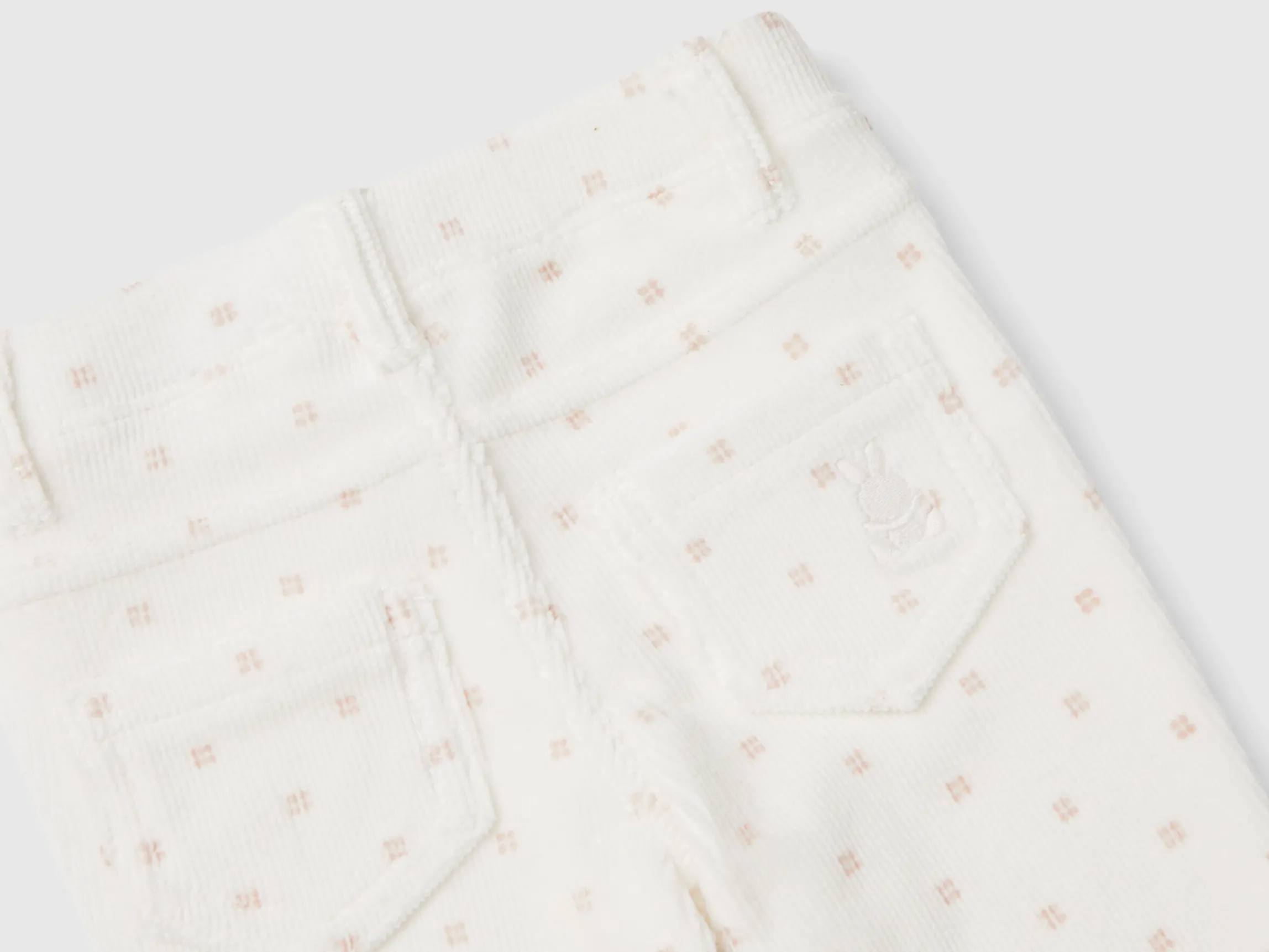 Trousers with chenille pattern print